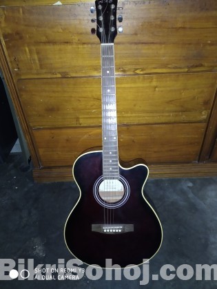 Ibanez electric guitar and axe acoustic guitar